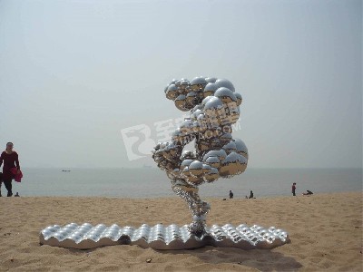 海边镜面抽象人物不锈钢雕塑定制